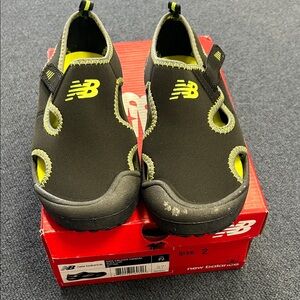 New Balance Black and Neon Kids' water shows